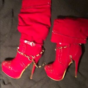 Red velvet chic boots with gold chains and accents